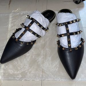 Brand new, black flats size 10